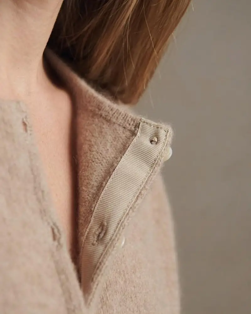 Vellara Knitwear internal grosgrain ribbon placket reinforcement detail